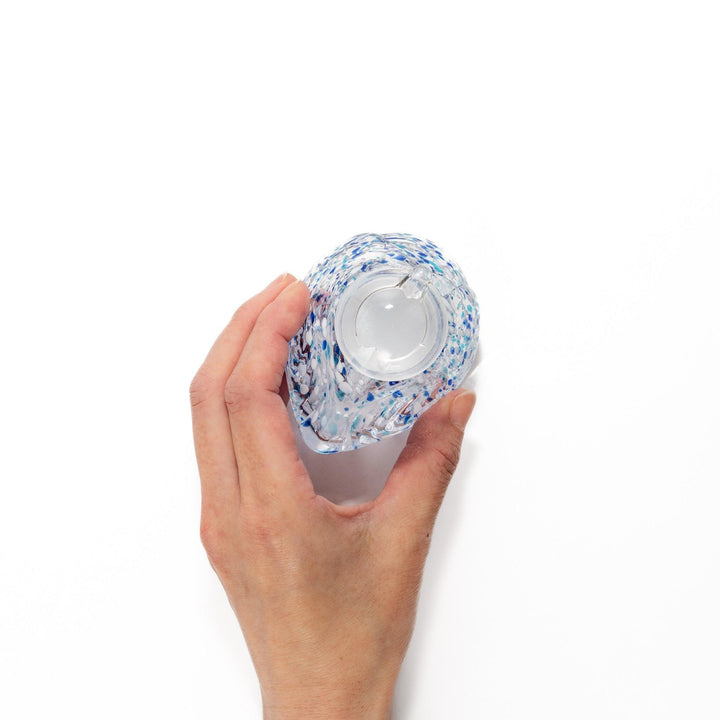 Blue and white speckled Ethereal Songbird soy sauce dispenser with a charming bird design, perfect for adding a cheerful touch to your dining experience.