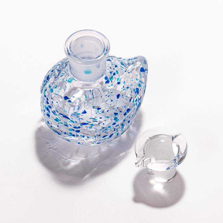 Blue and white speckled Ethereal Songbird soy sauce dispenser with a charming bird design, perfect for adding a cheerful touch to your dining experience.