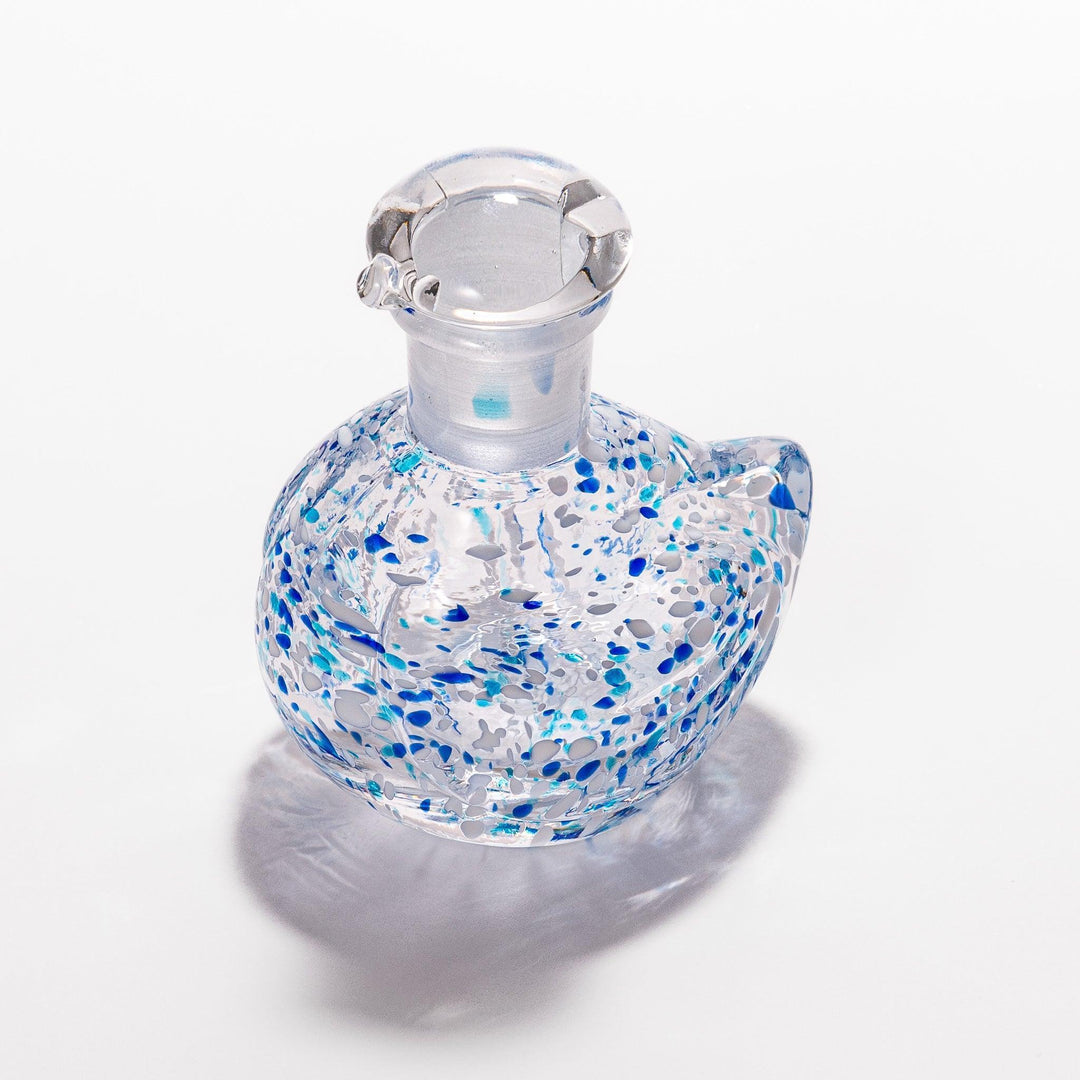 Blue and white speckled Ethereal Songbird soy sauce dispenser with a charming bird design, perfect for adding a cheerful touch to your dining experience.