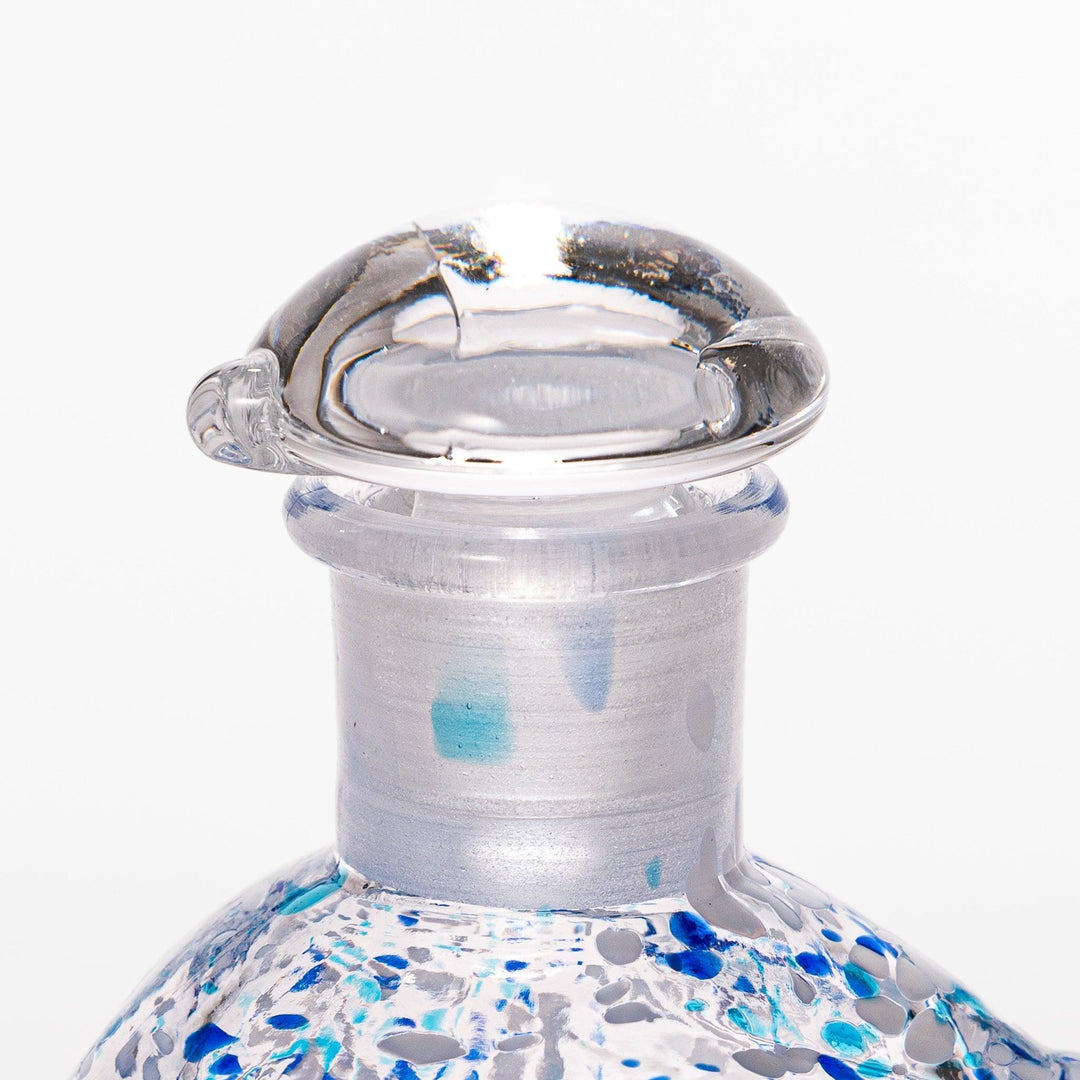 Blue and white speckled Ethereal Songbird soy sauce dispenser with a charming bird design, perfect for adding a cheerful touch to your dining experience.