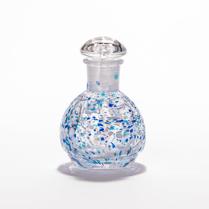 Blue and white speckled Ethereal Songbird soy sauce dispenser with a charming bird design, perfect for adding a cheerful touch to your dining experience.