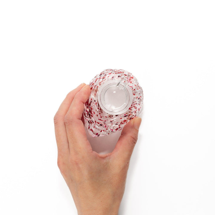 Red and white speckled Ethereal Songbird soy sauce dispenser with a delicate bird design, adding a vibrant touch to your dining experience.