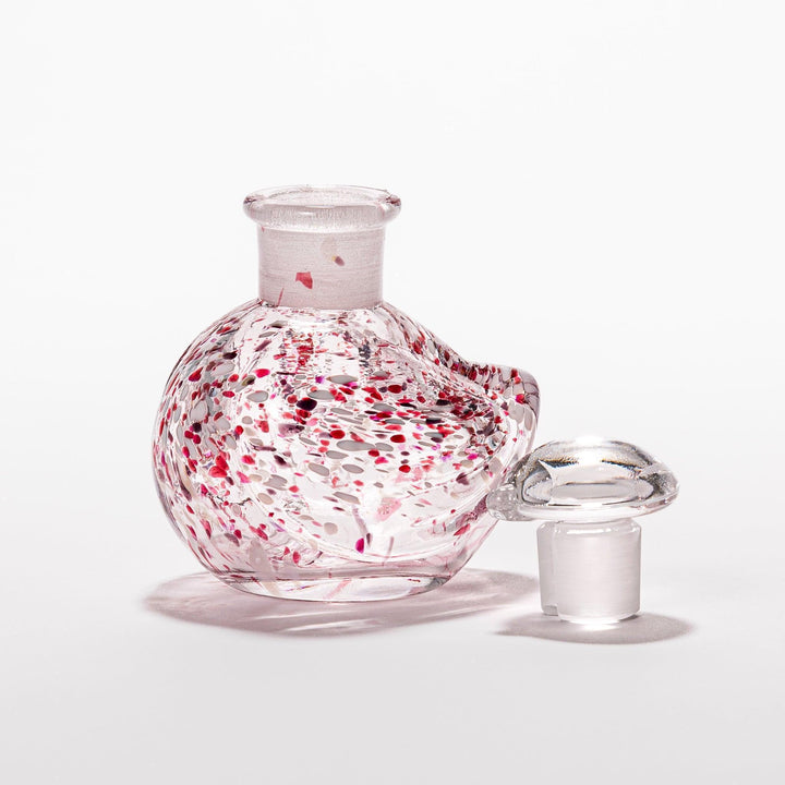 Red and white speckled Ethereal Songbird soy sauce dispenser with a delicate bird design, adding a vibrant touch to your dining experience.