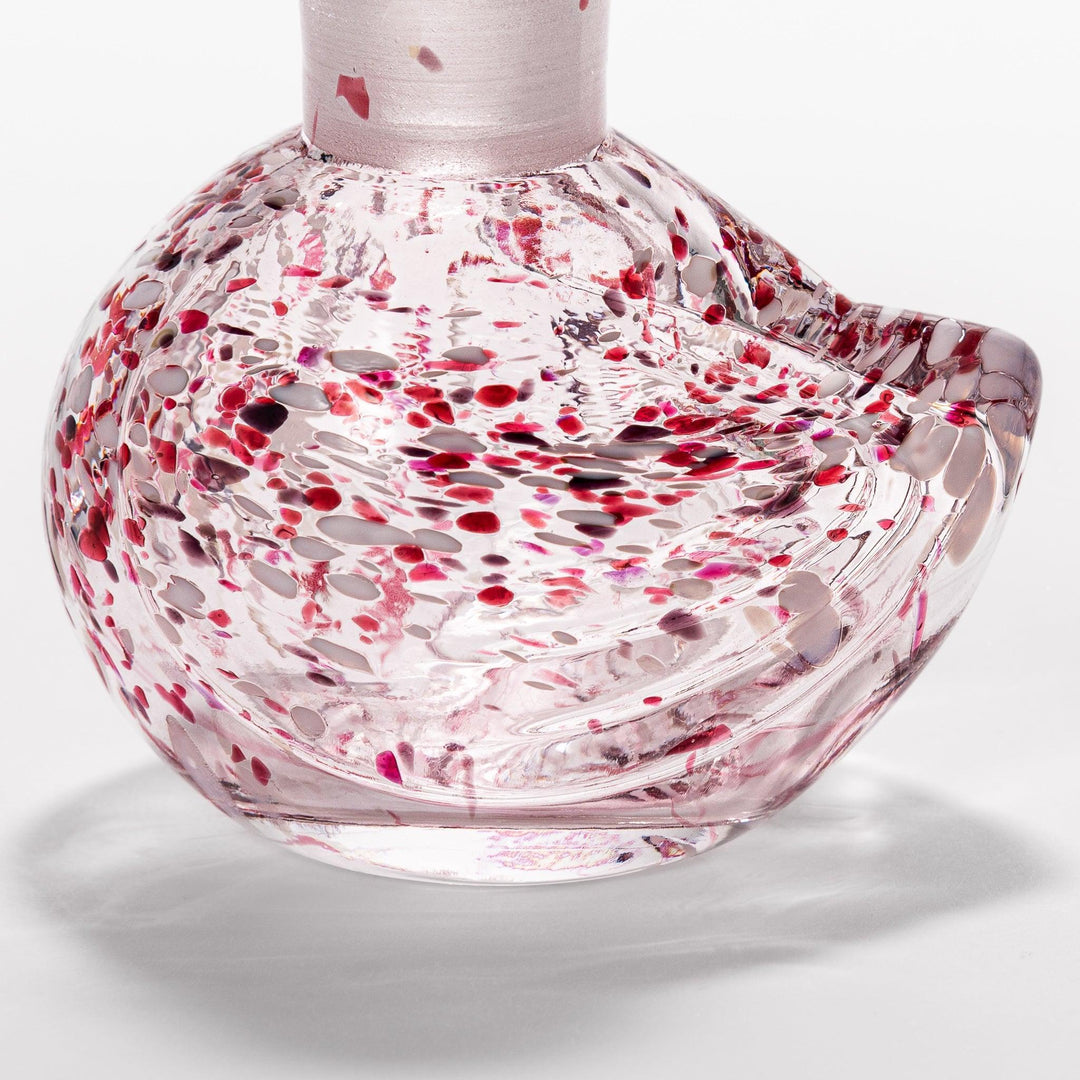 Red and white speckled Ethereal Songbird soy sauce dispenser with a delicate bird design, adding a vibrant touch to your dining experience.