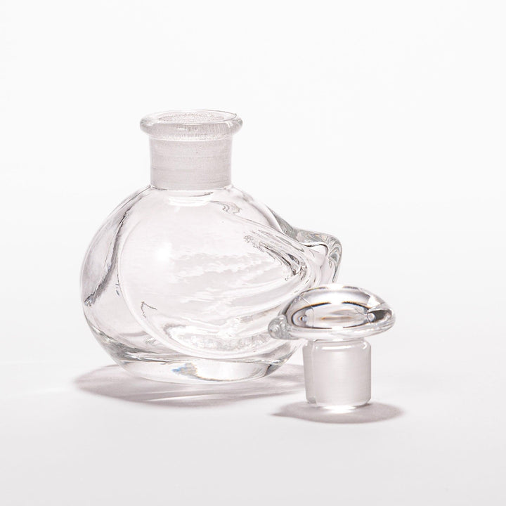 Clear glass Ethereal Songbird soy sauce dispenser with a delicate bird design, perfect for adding elegance and charm to your table setting.