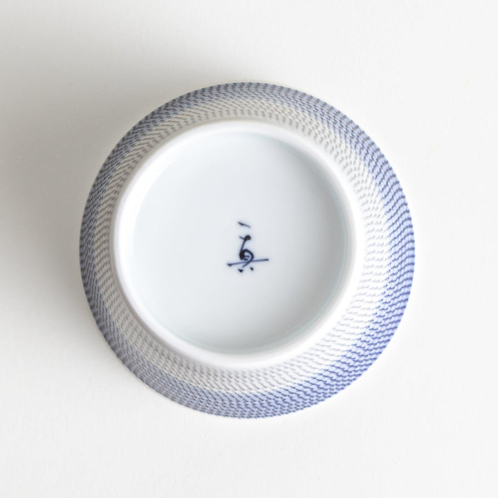 Ceramic condiment bowls, each with a delicate gradient pattern. The bowls are in various pastel colors, including red, green, turkish blue, purple, and blue showcasing their textured design.