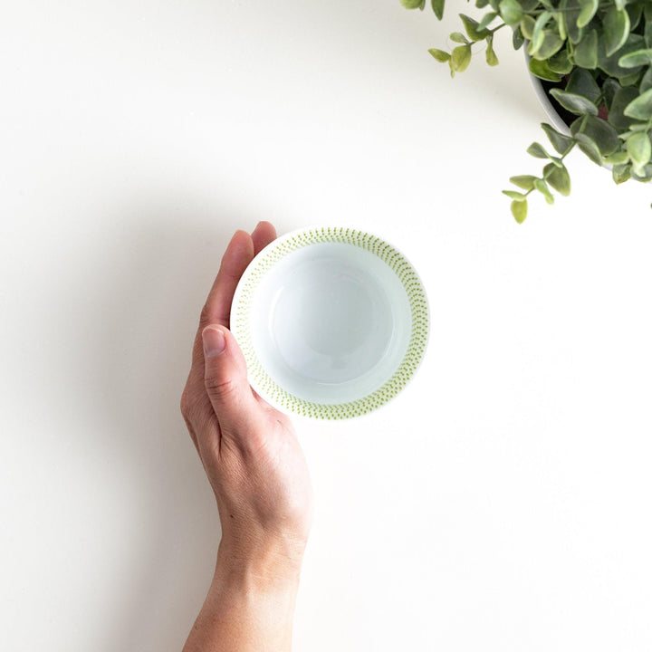 Ceramic condiment bowls, each with a delicate gradient pattern. The bowls are in various pastel colors, including red, green, turkish blue, purple, and blue showcasing their textured design.
