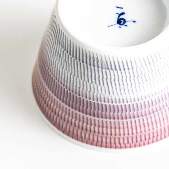 Ceramic condiment bowls, each with a delicate gradient pattern. The bowls are in various pastel colors, including red, green, turkish blue, purple, and blue showcasing their textured design.