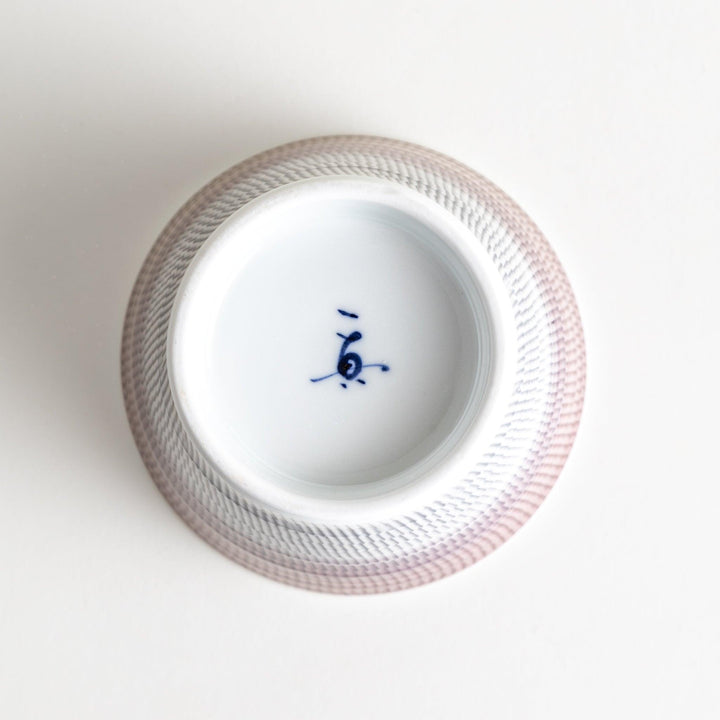 Ceramic condiment bowls, each with a delicate gradient pattern. The bowls are in various pastel colors, including red, green, turkish blue, purple, and blue showcasing their textured design.