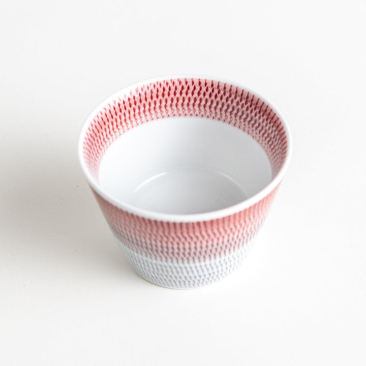 Ceramic condiment bowls, each with a delicate gradient pattern. The bowls are in various pastel colors, including red, green, turkish blue, purple, and blue showcasing their textured design.