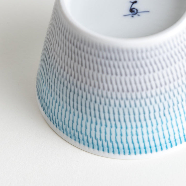 Ceramic condiment bowls, each with a delicate gradient pattern. The bowls are in various pastel colors, including red, green, turkish blue, purple, and blue showcasing their textured design.