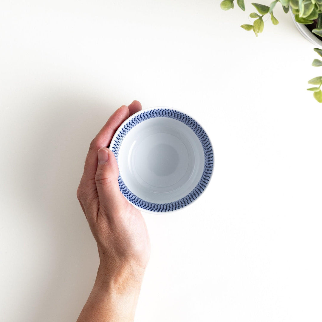 Ceramic condiment bowls, each with a delicate gradient pattern. The bowls are in various pastel colors, including red, green, turkish blue, purple, and blue showcasing their textured design.
