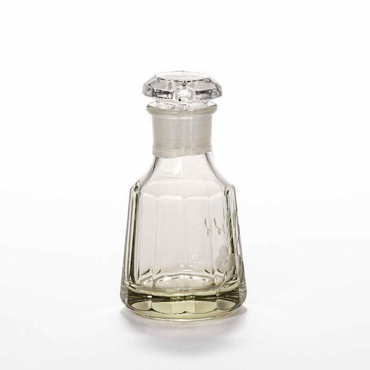 Elegant soy sauce dispenser with a frosted plum blossom design, featuring a smooth pour spout and an intricate geometric base. 