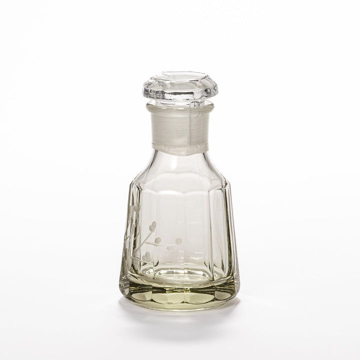 Elegant soy sauce dispenser with a frosted plum blossom design, featuring a smooth pour spout and an intricate geometric base. 