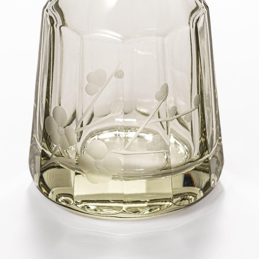 Elegant soy sauce dispenser with a frosted plum blossom design, featuring a smooth pour spout and an intricate geometric base. 