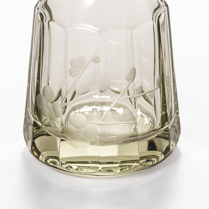 Elegant soy sauce dispenser with a frosted plum blossom design, featuring a smooth pour spout and an intricate geometric base. 