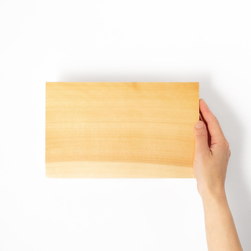 Rectangular hinoki wood sushi plate with clean lines and raised legs, perfect for serving sushi or appetizers with a refined traditional aesthetic.