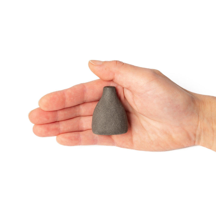 Minimalist dark ceramic bud vase with a teardrop silhouette and textured surface, perfect for adding earthy elegance to floral or dried arrangements.