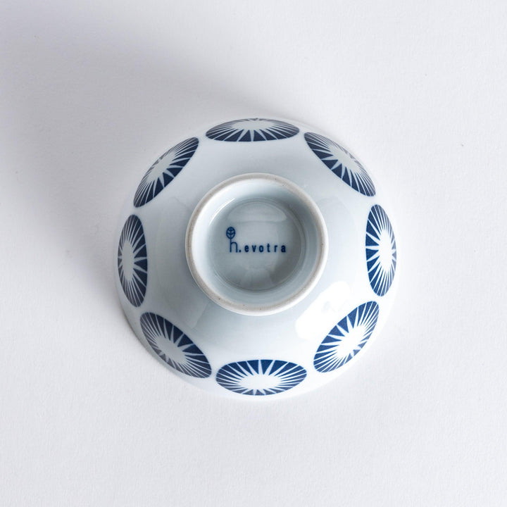 Bottom view of the Modern Indigo Circle Rice Bowl, showing the smooth white surface and blue base with no additional markings.