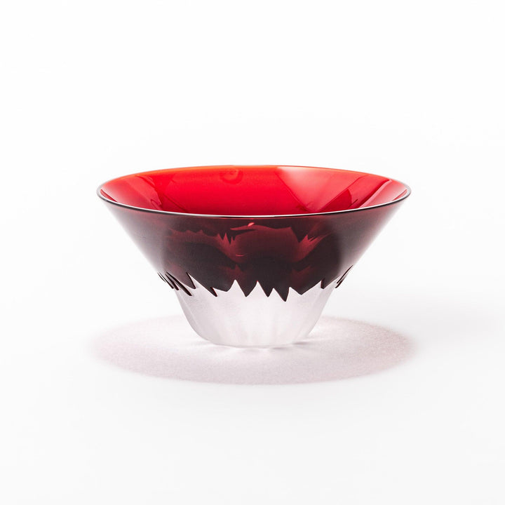Red glass sake cup in the form of Mount Fuji, complete with a frosted snowcap design, crafted for elegant Japanese-style celebrations.
