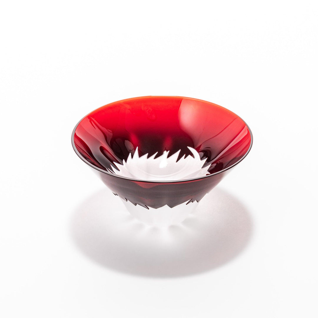 Red glass sake cup in the form of Mount Fuji, complete with a frosted snowcap design, crafted for elegant Japanese-style celebrations.