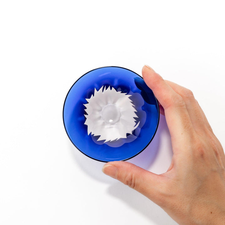 Blue glass sake cup shaped like Mount Fuji with a frosted white snowcap, ideal for celebrations and authentic Japanese dining.