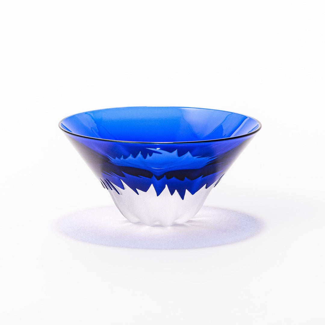 Blue glass sake cup shaped like Mount Fuji with a frosted white snowcap, ideal for celebrations and authentic Japanese dining.
