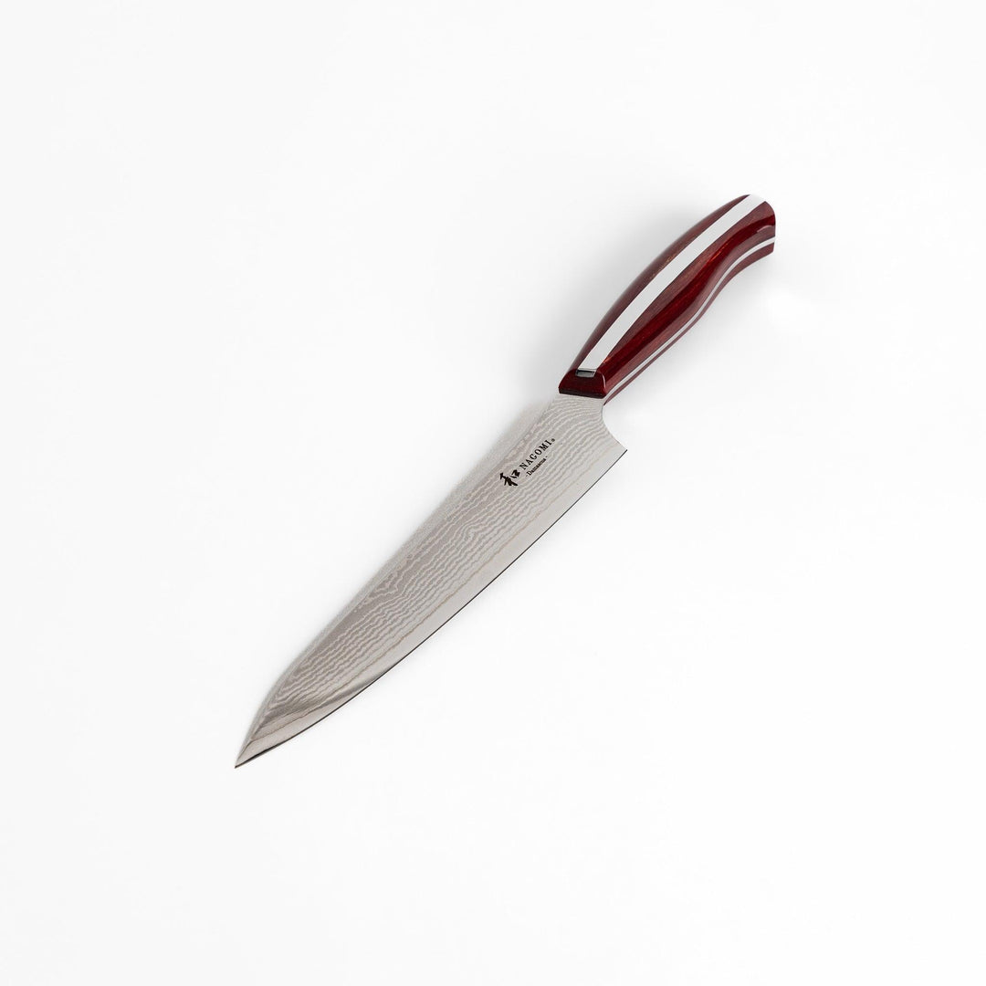 A high-quality Nagomi Damascus utility knife with a beautifully patterned blade and a striped wooden handle, offering excellent precision for everyday kitchen tasks.