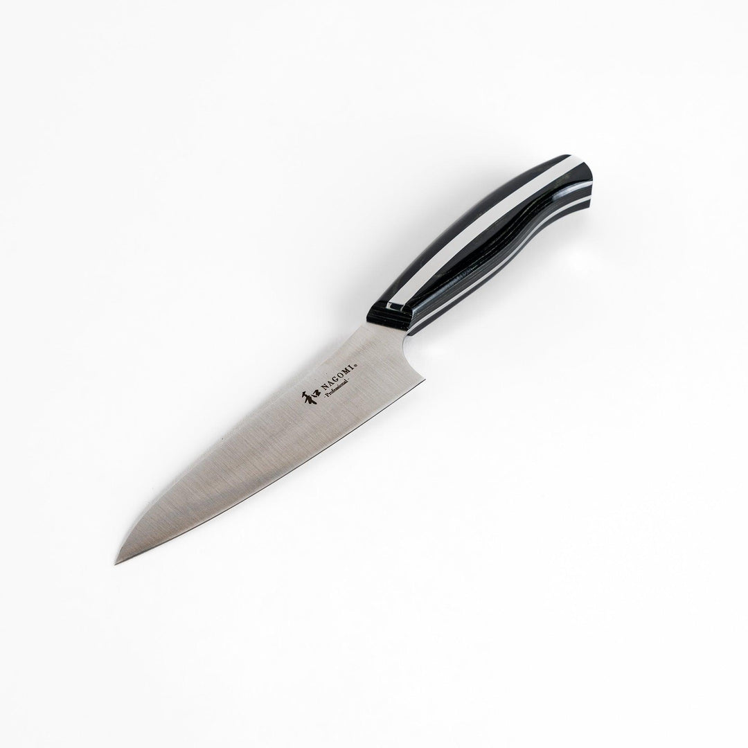 A Nagomi Professional utility knife with a sleek, sharp blade and a modern striped handle, offering precision and comfort for all your kitchen tasks.