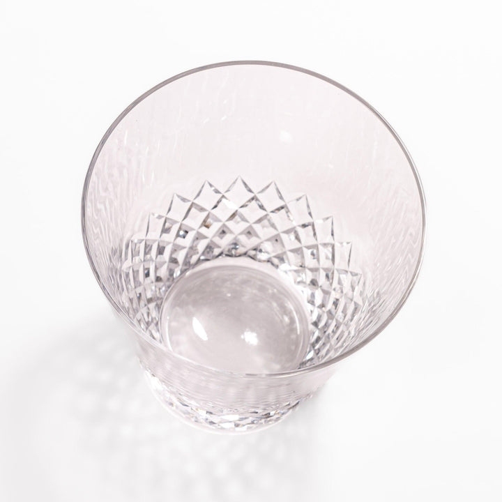 Clear nostalgia rocks glass with diamond-cut texture on the lower half, perfect for serving whisky, cocktails, or everyday beverages.