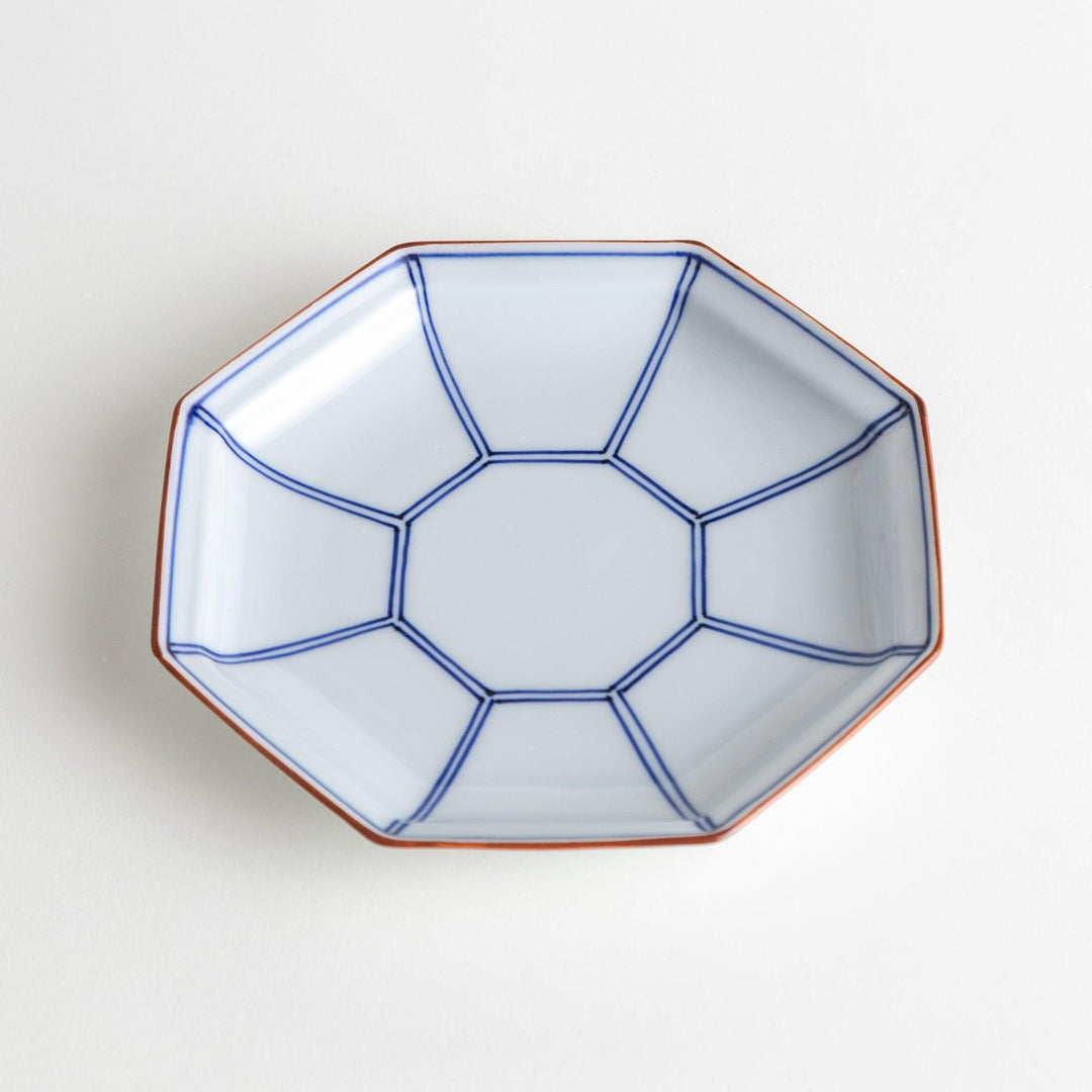 An octagonal porcelain large dessert plate with a minimalist grid pattern.