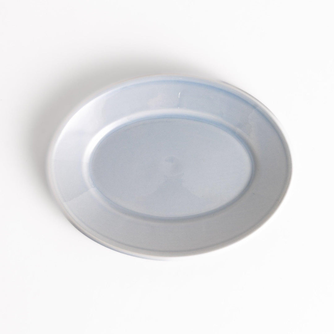 Durable and elegant blue ceramic dessert plate, adding a pop of sunshine to your table setting.