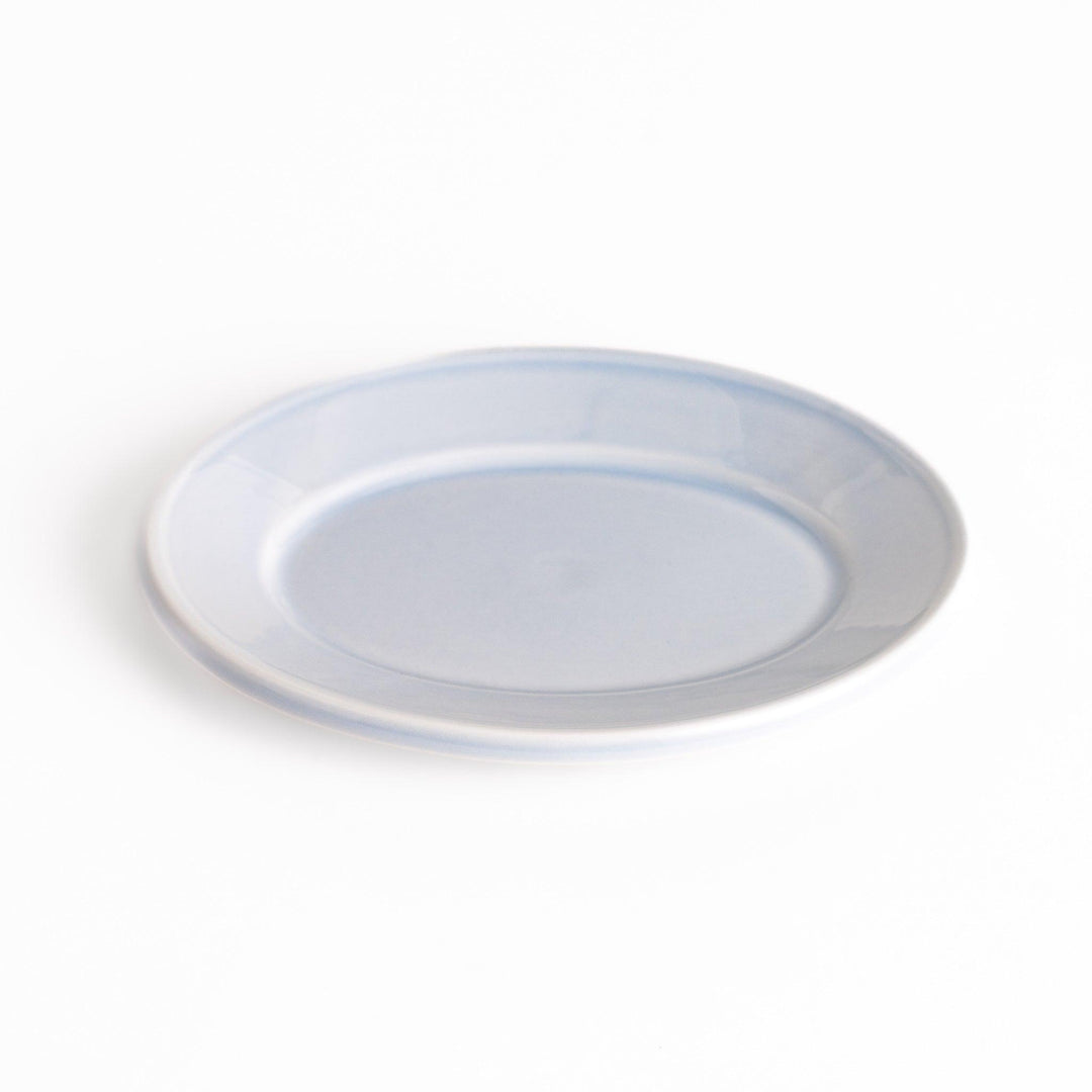 Durable and elegant blue ceramic dessert plate, adding a pop of sunshine to your table setting.