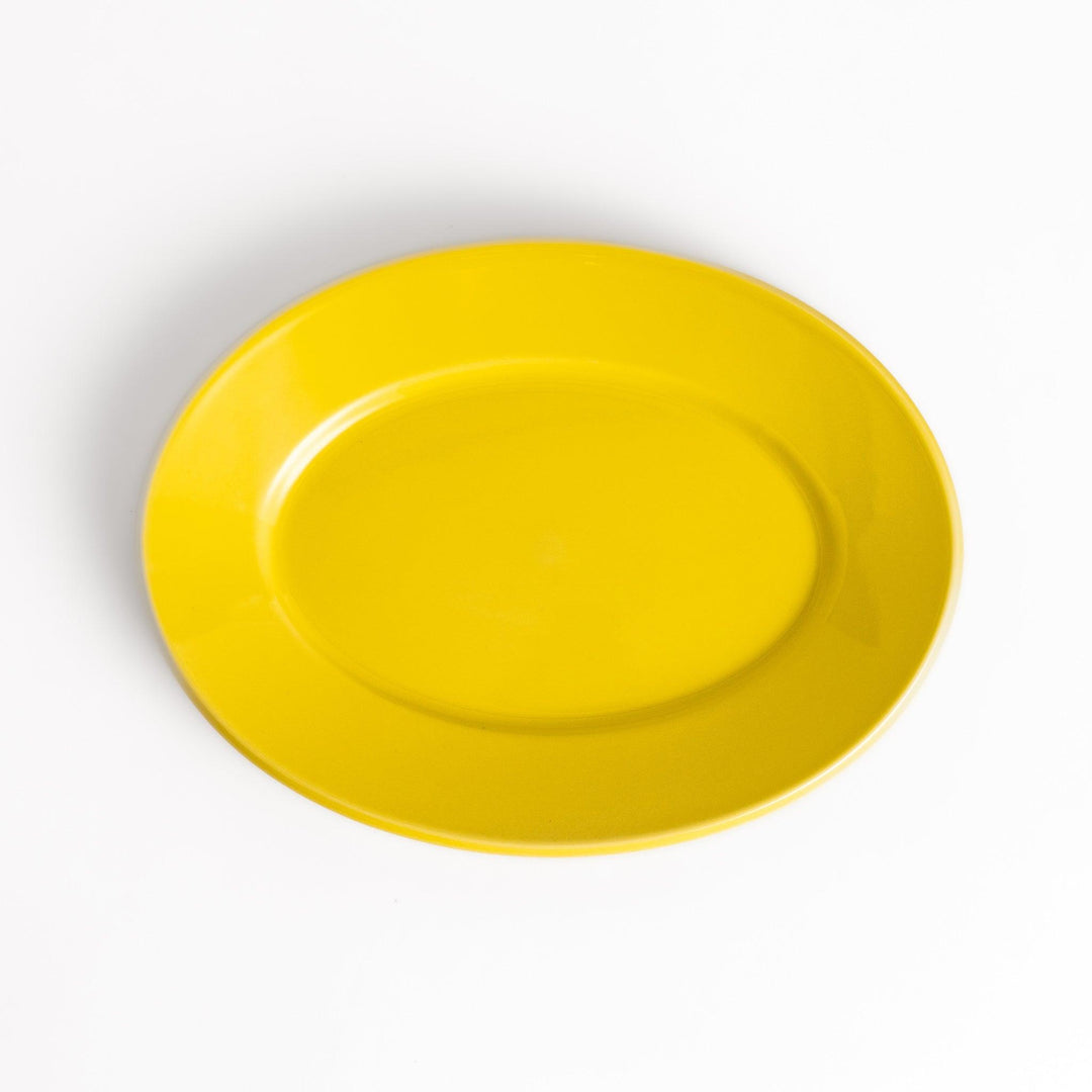 Durable and elegant yellow ceramic salad plate, adding a pop of color to your table setting.