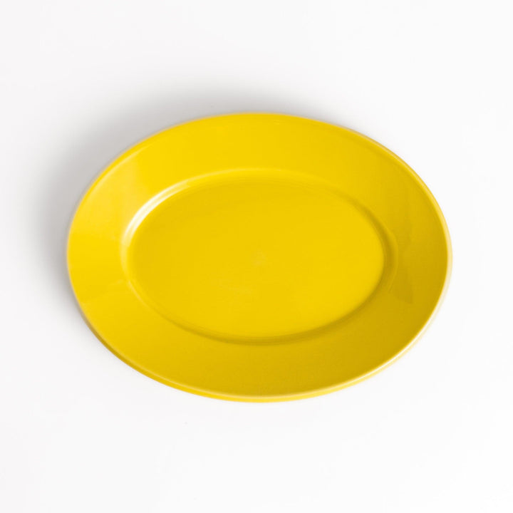 Durable and elegant yellow ceramic salad plate, adding a pop of color to your table setting.