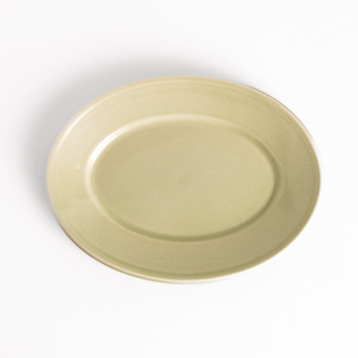 Durable and elegant green ceramic salad plate, adding a pop of color to your table setting.