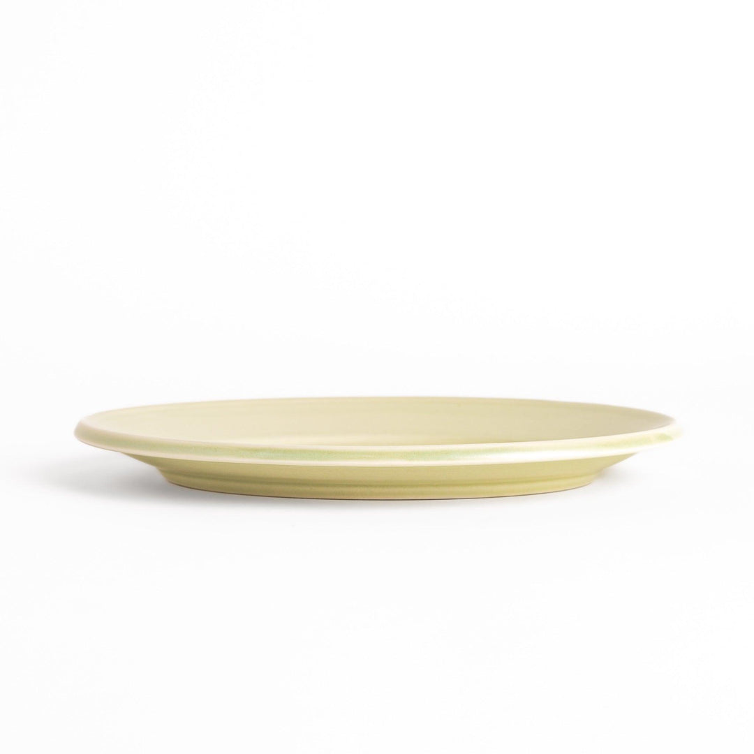 Durable and elegant green ceramic salad plate, adding a pop of color to your table setting.
