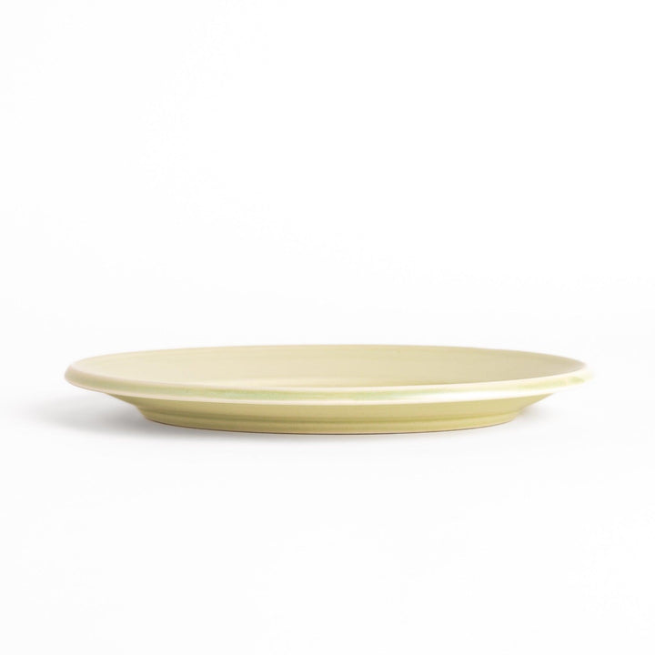 Durable and elegant green ceramic salad plate, adding a pop of color to your table setting.