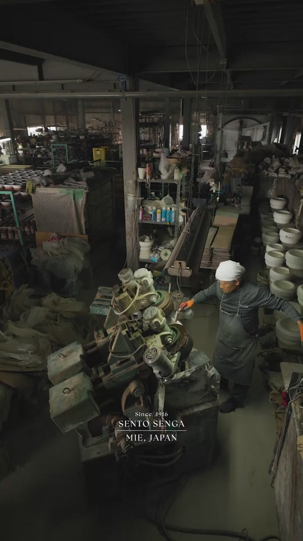 Japanese artisans crafting traditional clay donabe hot pots, shaping, painting, and glazing pottery at Sento Senga workshop in Mie Japan