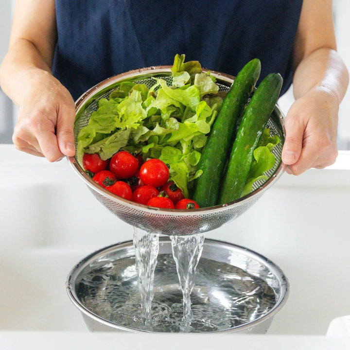 Versatile Japanese stainless steel mixing bowl and mesh strainer set available in four sizes for washing and cooking prep