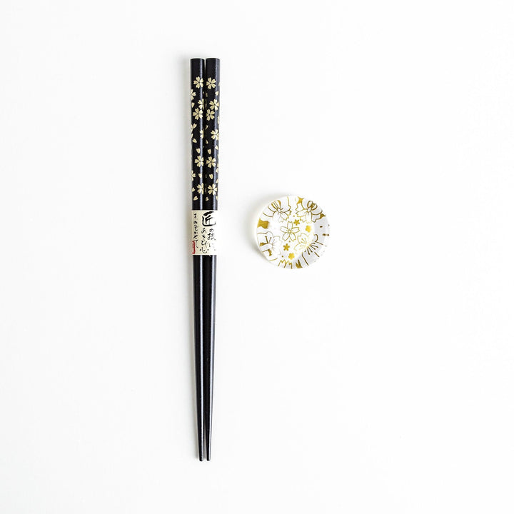Red lacquer chopsticks with sakura patterns. Available in black or red.
