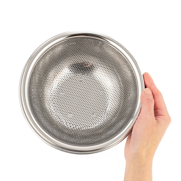 Compact stainless steel mesh strainer bowl with precision-punched holes and sturdy rim, perfect for small-scale rinsing and draining tasks.