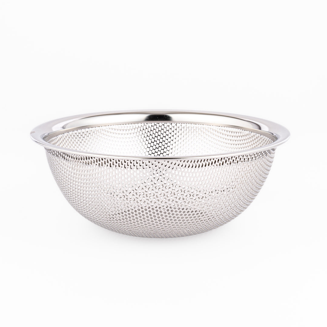 Fine mesh stainless steel strainer bowl with wide rim and curved shape, ideal for washing grains, fruits, or vegetables with ease.