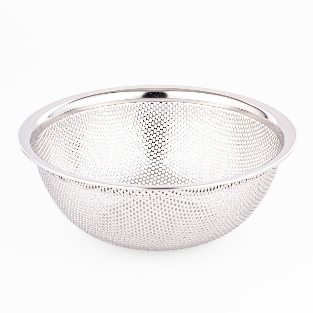 Fine mesh stainless steel strainer bowl with wide rim and curved shape, ideal for washing grains, fruits, or vegetables with ease.