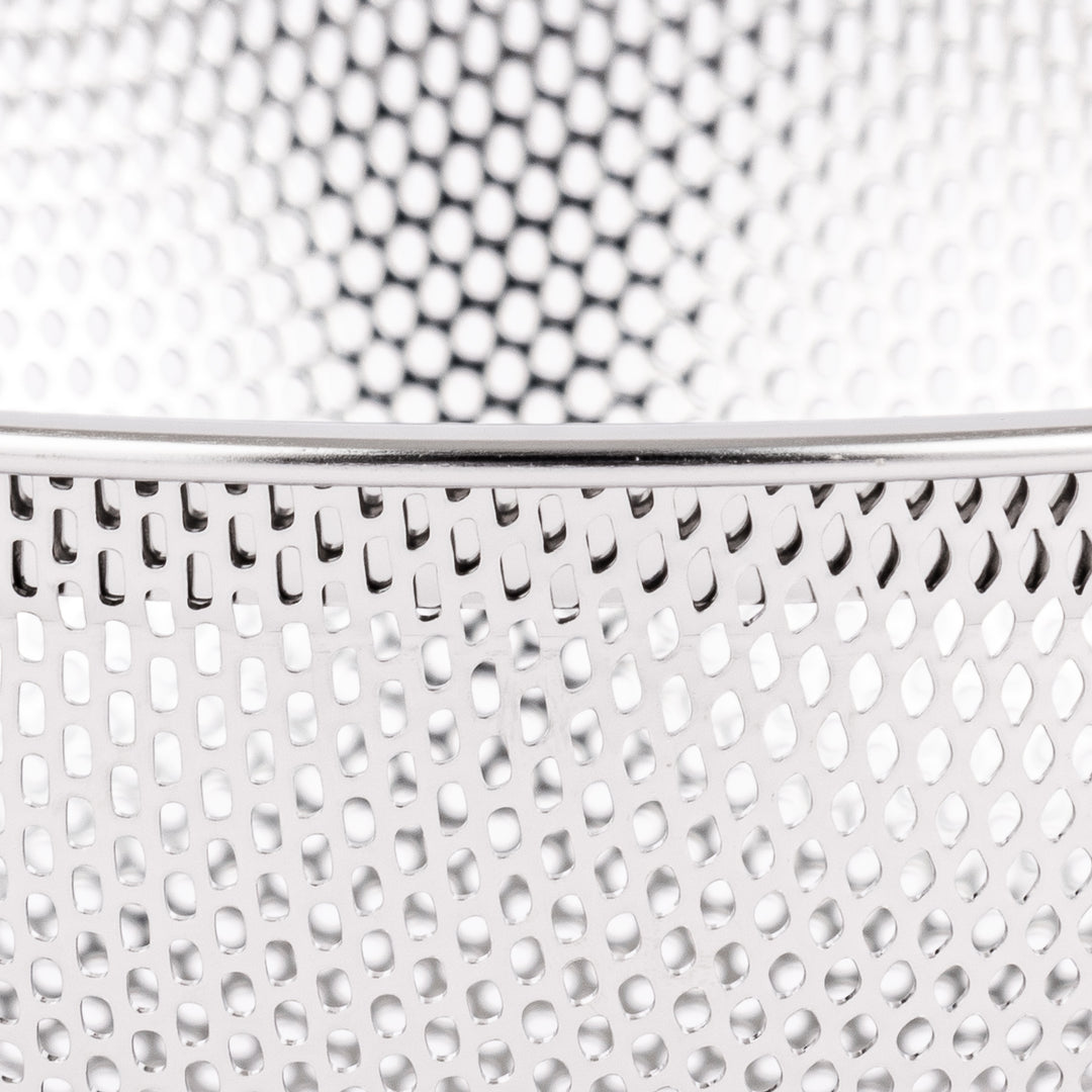 Fine mesh stainless steel strainer bowl with wide rim and curved shape, ideal for washing grains, fruits, or vegetables with ease.