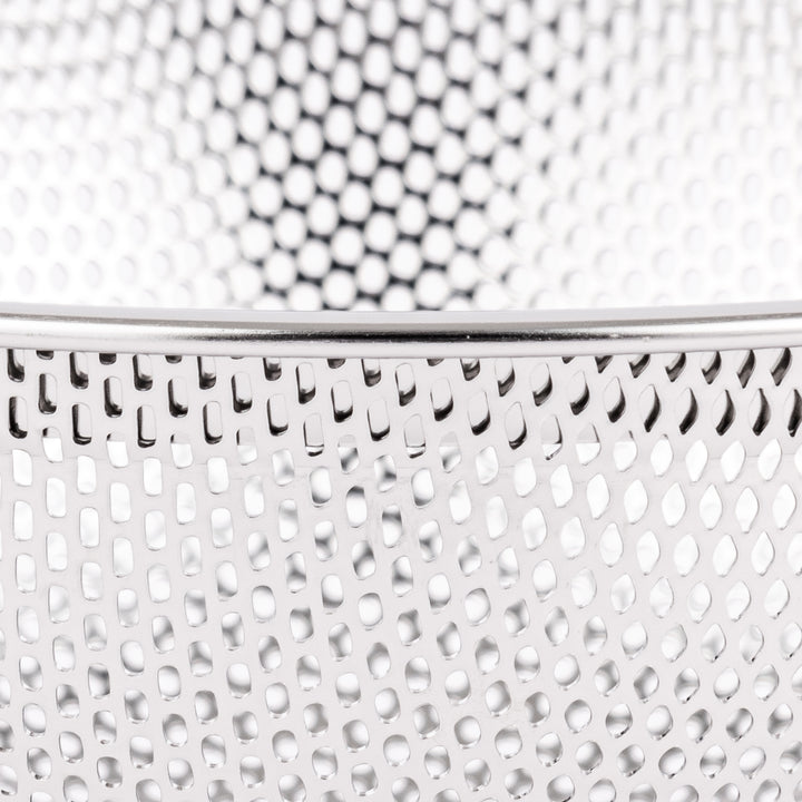 Fine mesh stainless steel strainer bowl with wide rim and curved shape, ideal for washing grains, fruits, or vegetables with ease.