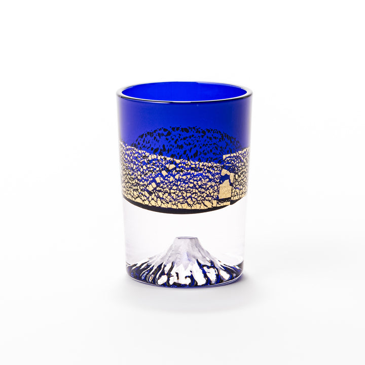 Deep blue sake glass with gold-leaf landscape design and detailed Mount Fuji motif sculpted inside the base, blending tradition and artistry.