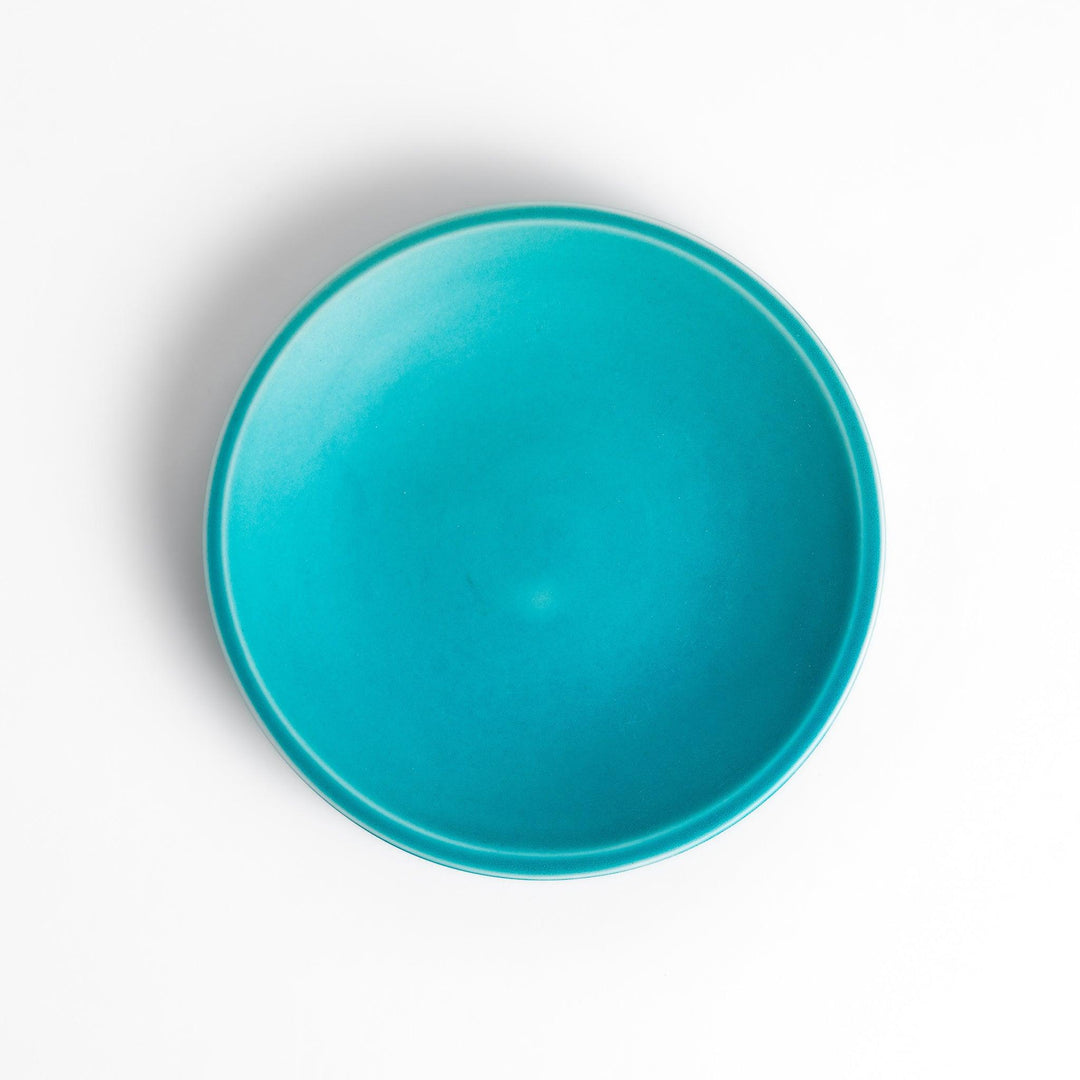 Smooth Turkish blue saucer with a minimalist design, complementing the tea cup with its clean, matte finish for a modern and elegant tea set.