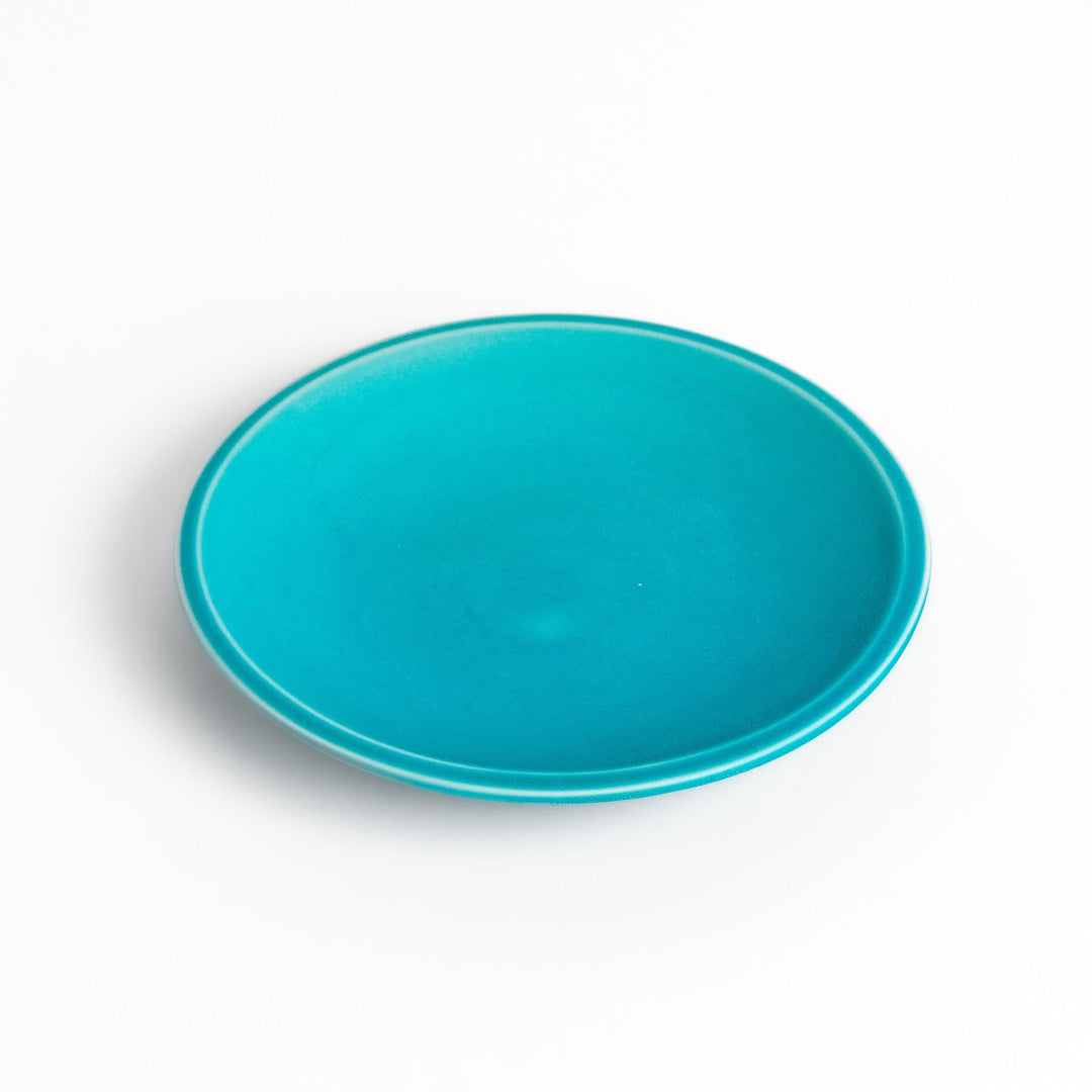 Smooth Turkish blue saucer with a minimalist design, complementing the tea cup with its clean, matte finish for a modern and elegant tea set.