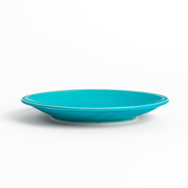 Smooth Turkish blue saucer with a minimalist design, complementing the tea cup with its clean, matte finish for a modern and elegant tea set.